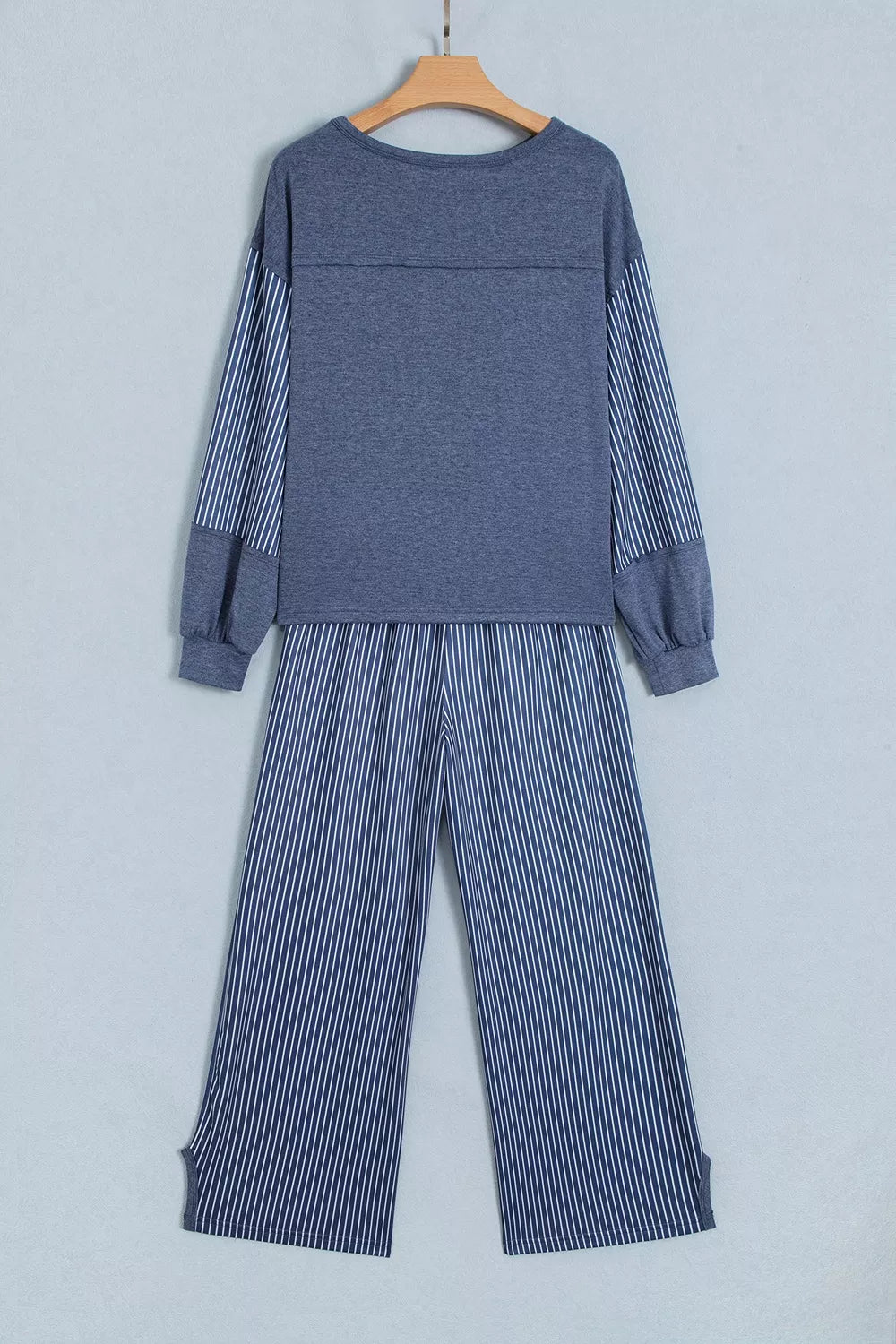 Top and drawstring pants set, blue set hanging back