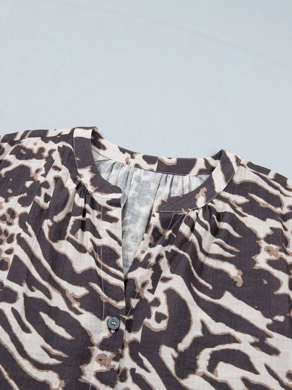 Leopard Print V Neck Button Down Balloon Sleeve Shirt in dark brown, construction detail
