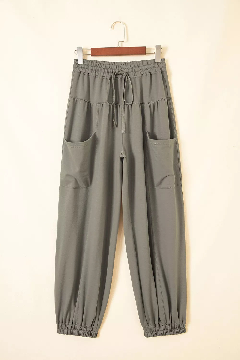 Drawstring Patch Pocket Jogger Pants in gray green, hanger front view