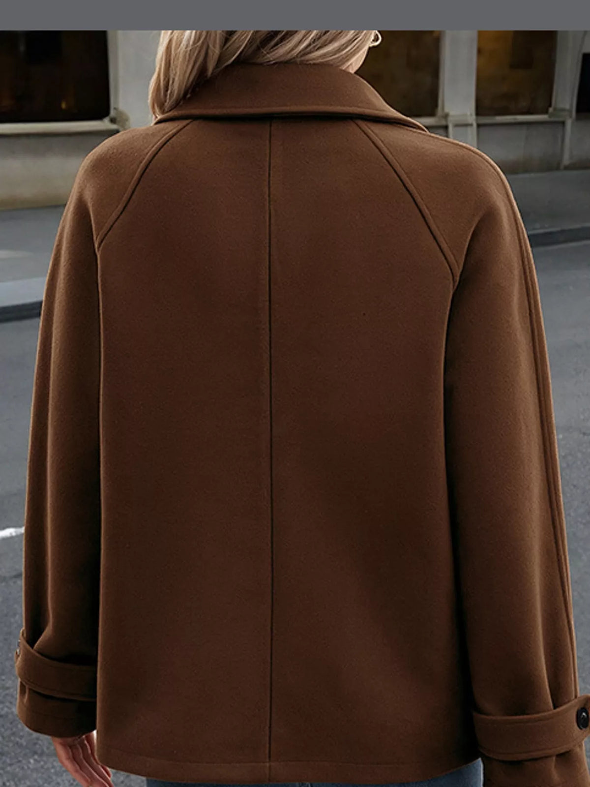 Brown button-up raglan sleeve coat — back view