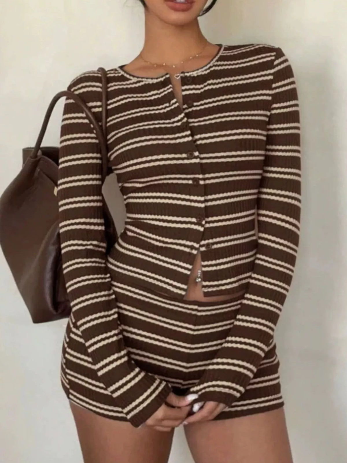 Striped cardigan and shorts set in brown and cream, front view