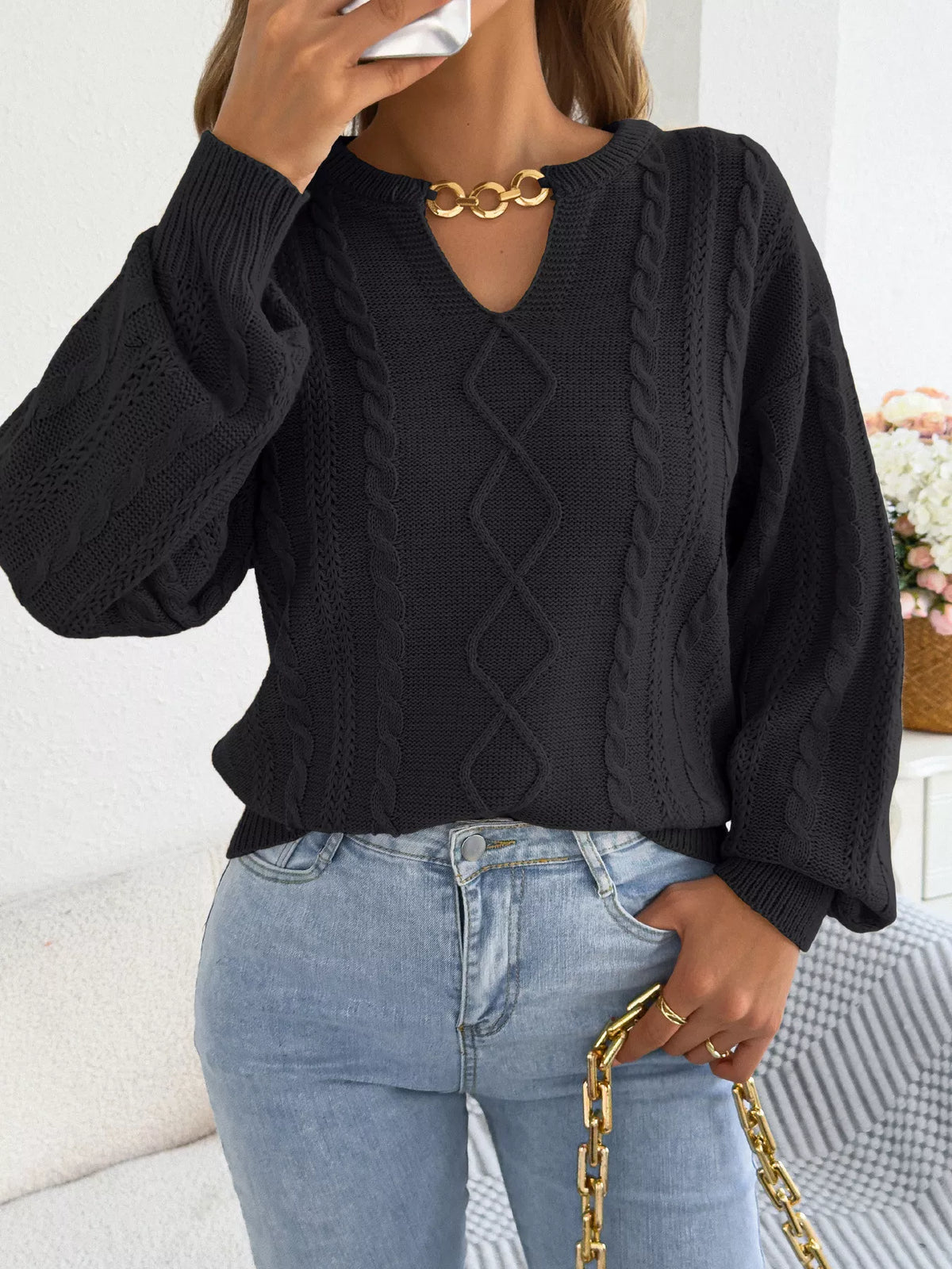 Black cable knit notched sweater