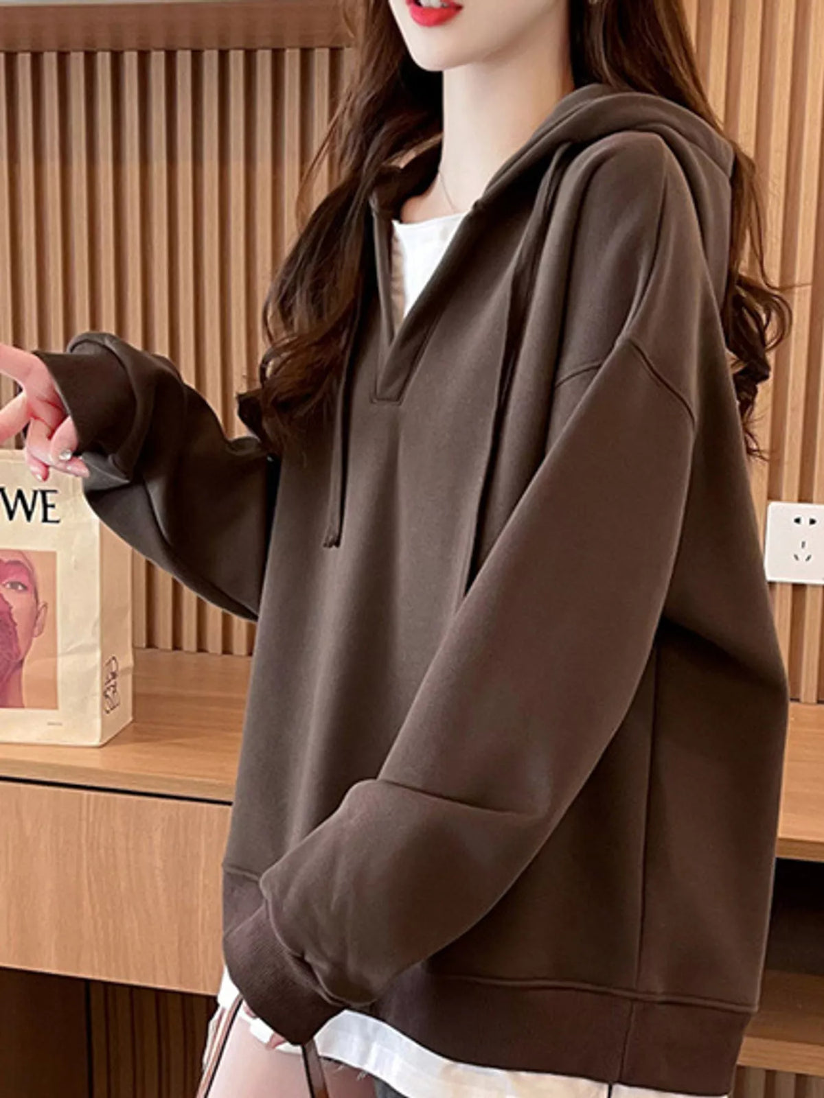 Brown layered look dropped shoulder hoodie, side view