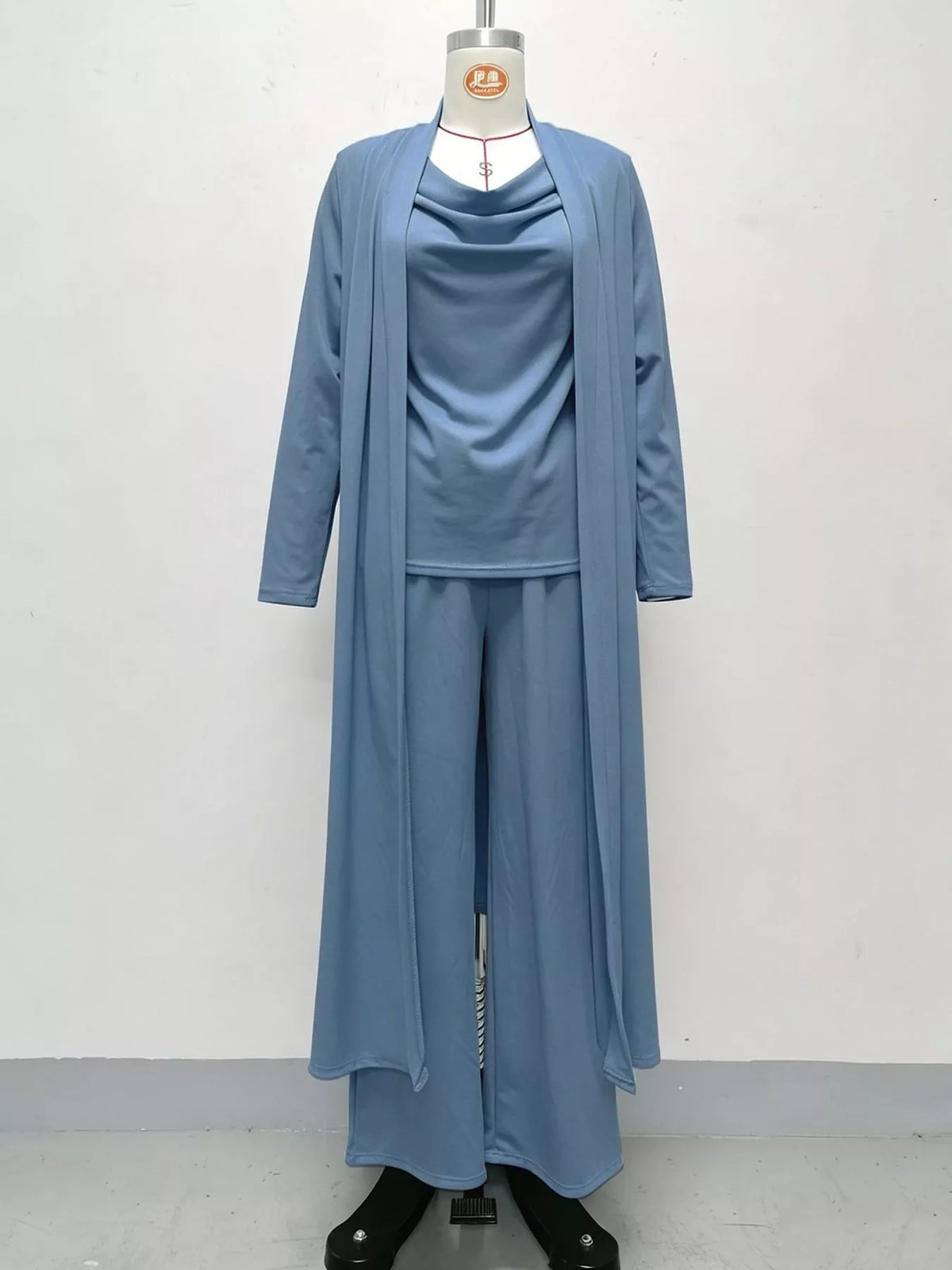 Blue cowl neck top, cardigan and pants set, front view