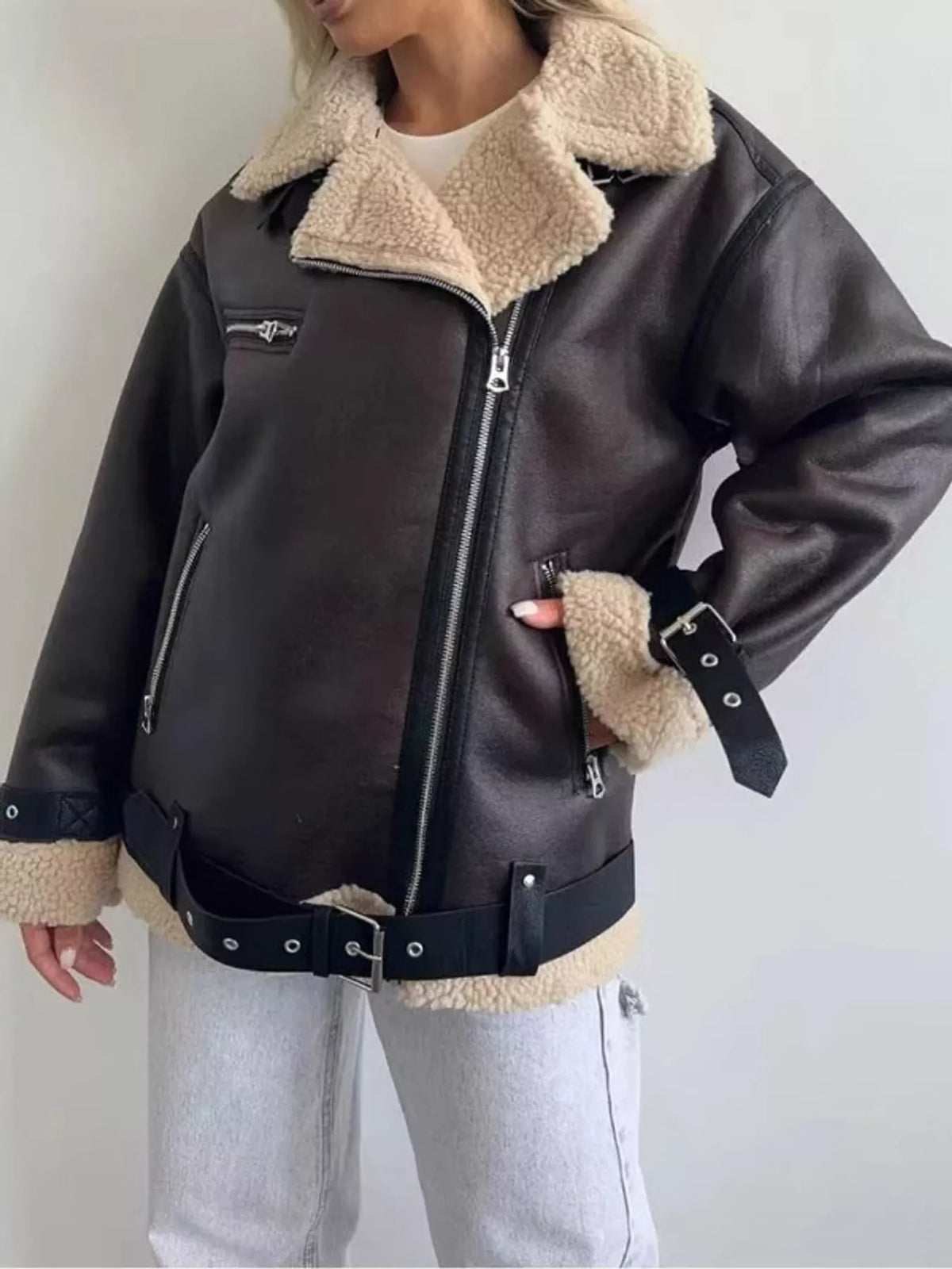 Black with cream trim faux leather zip up jacket, front view