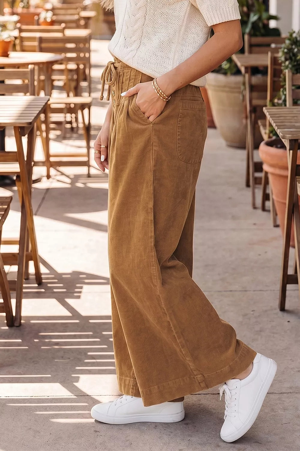 Brown button-detail wide-leg pants, side view