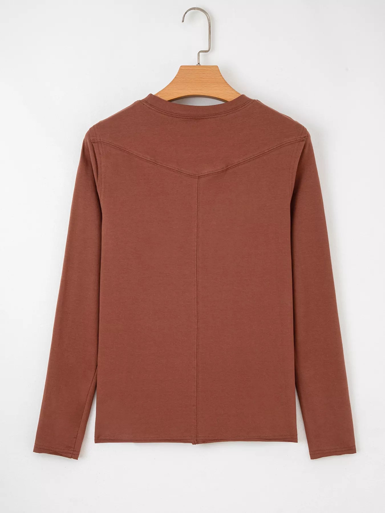 Trendsi Raw Seam Detail Solid Color Long Sleeve Top -