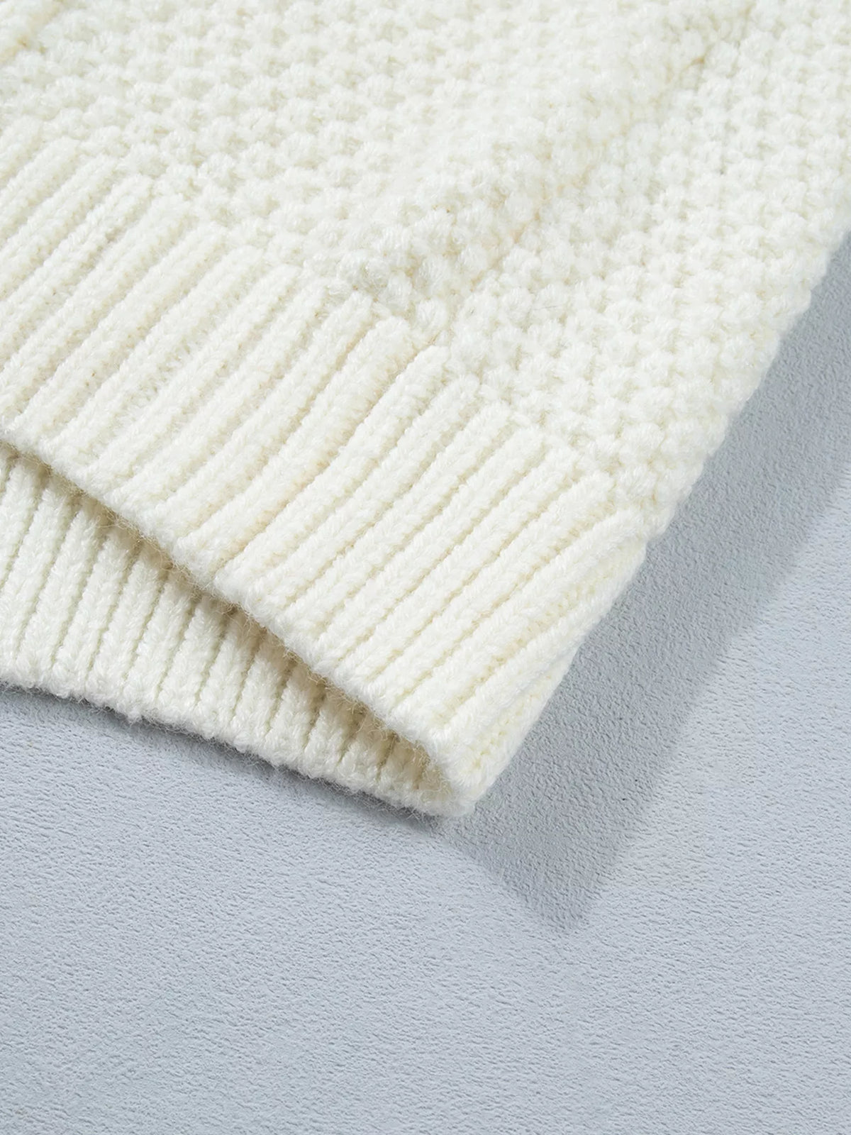 Reindeer Cable Knit Christmas Sweater in cream, construction detail