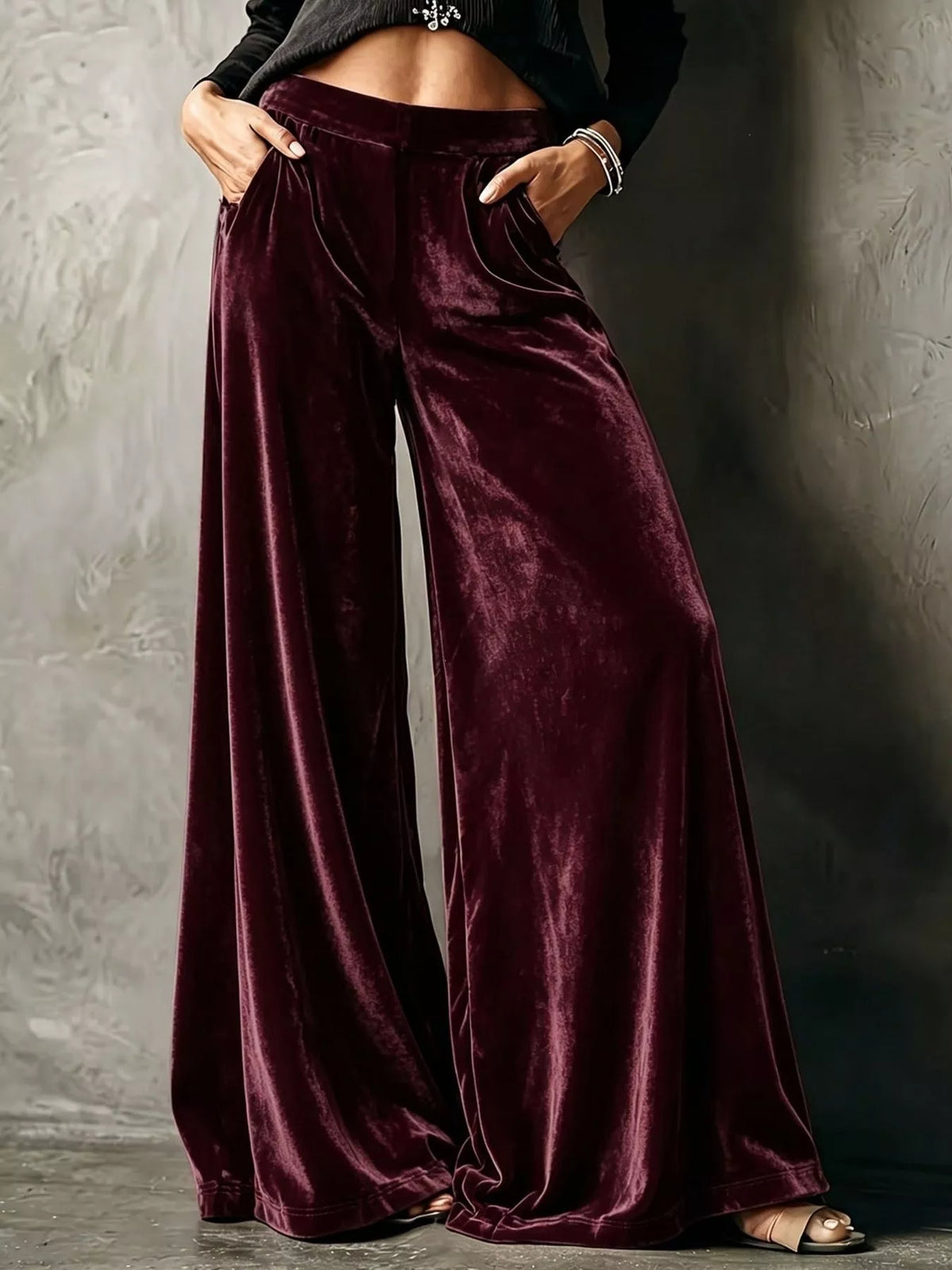 Burgundy wide-leg velvet pants, front view