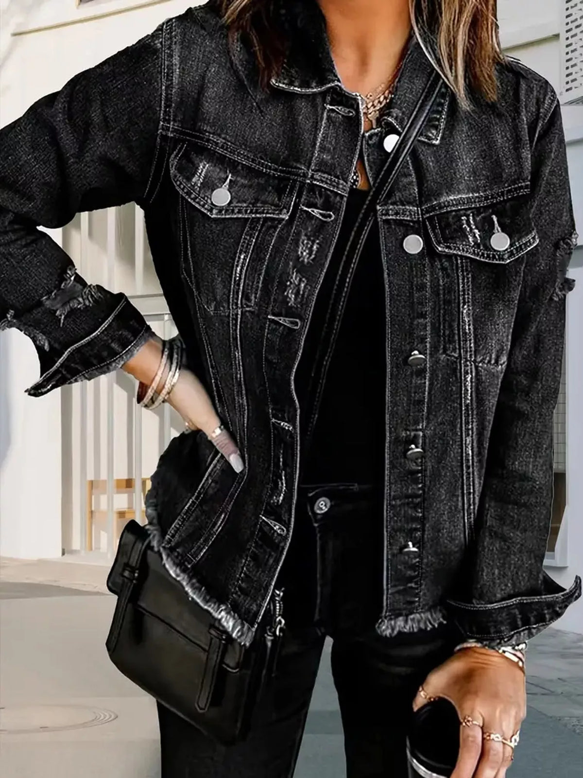 Women's Distressed Raw Hem Denim Jacket in black — front view