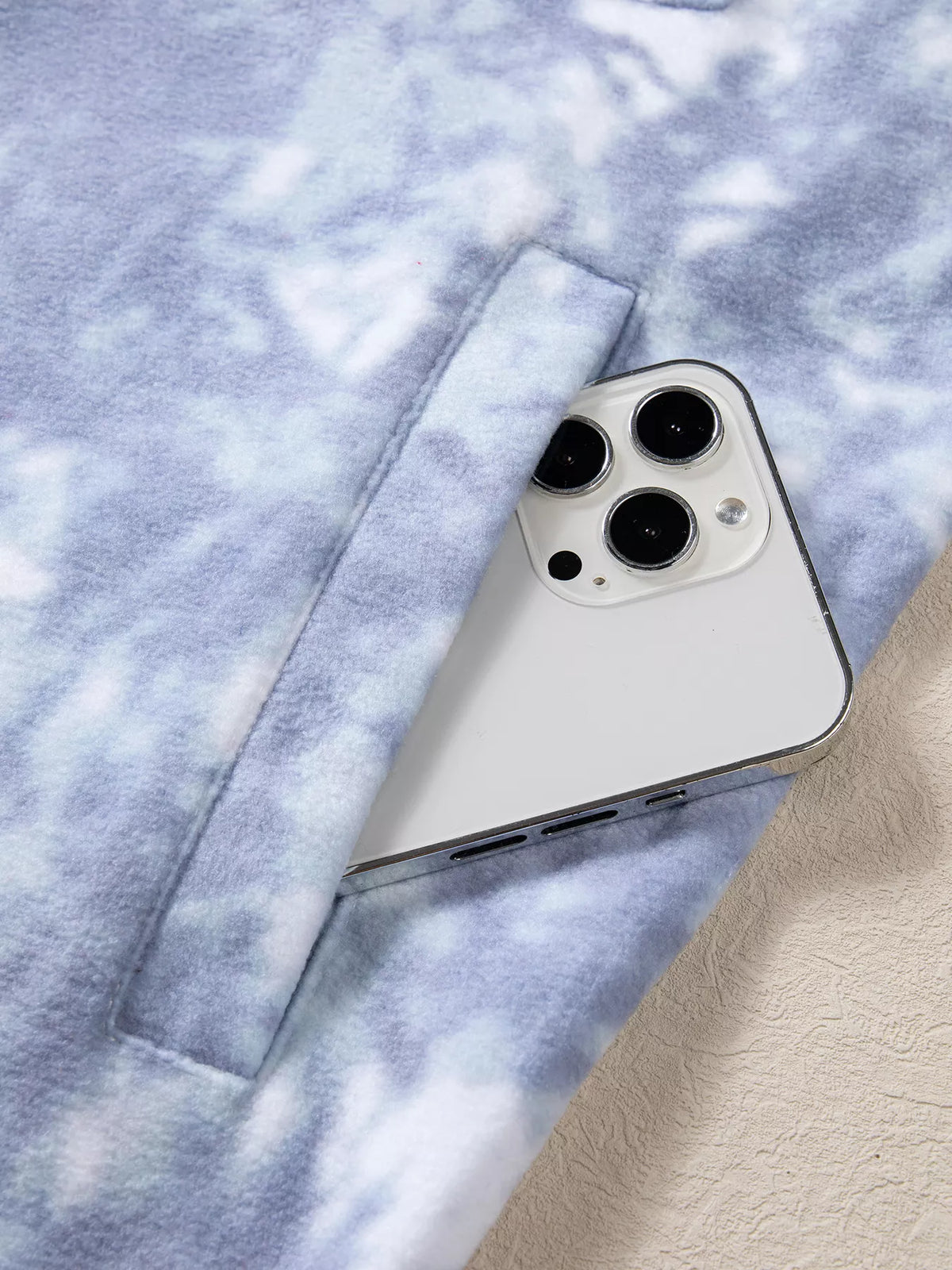 Chest pocket opening on light blue abstract print fuzzy collar tunic jacket