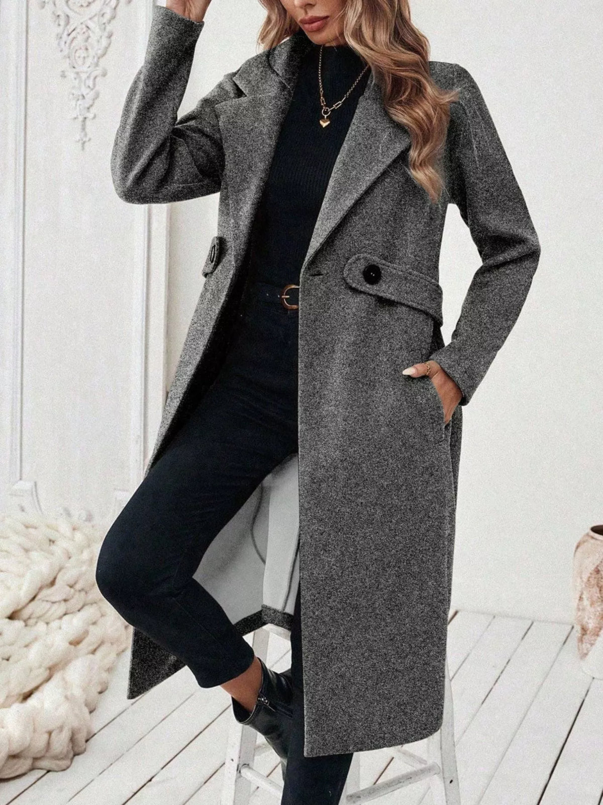 Gray lapel-collar longline coat, open front, knee bent