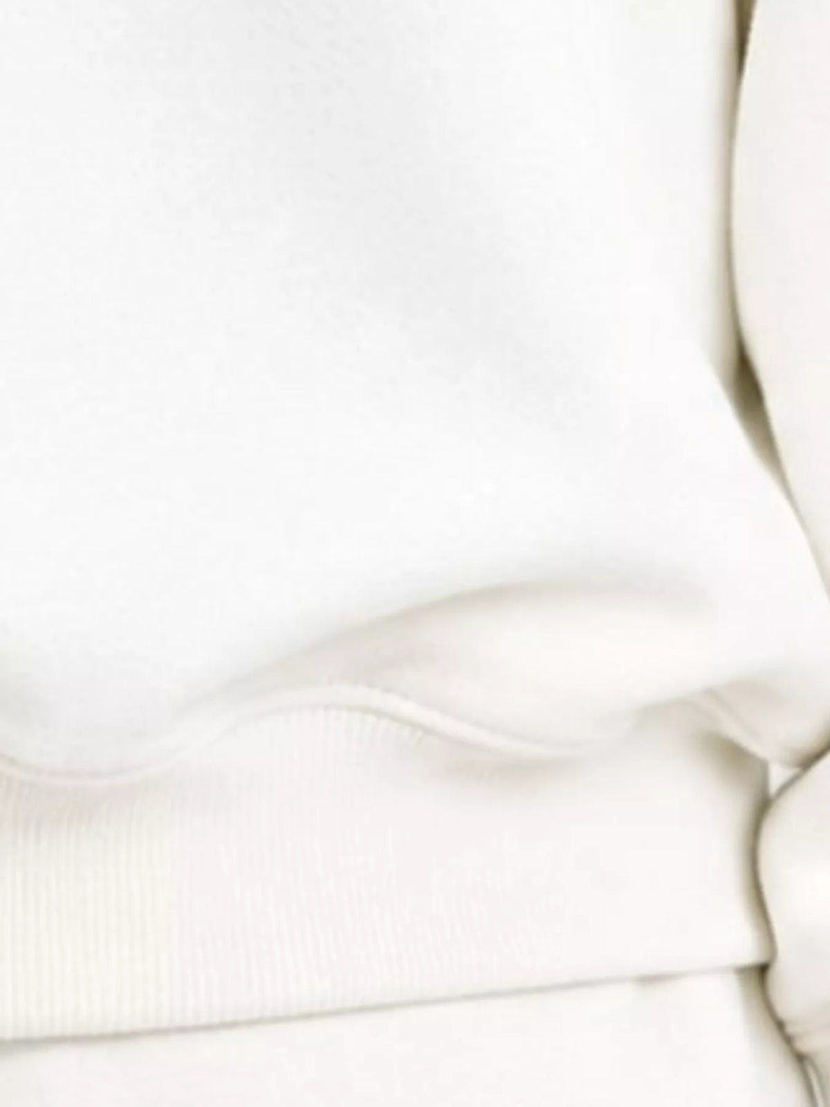 White oversized dropped shoulder sweatshirt, hem detail