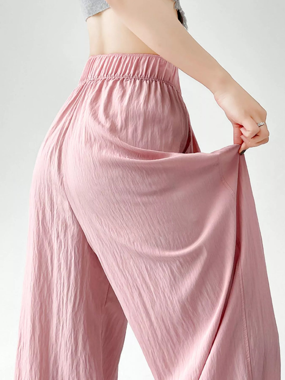Women's High-Waisted Loose Fit Wide-Leg Casual Pants in pink — fabric detail view