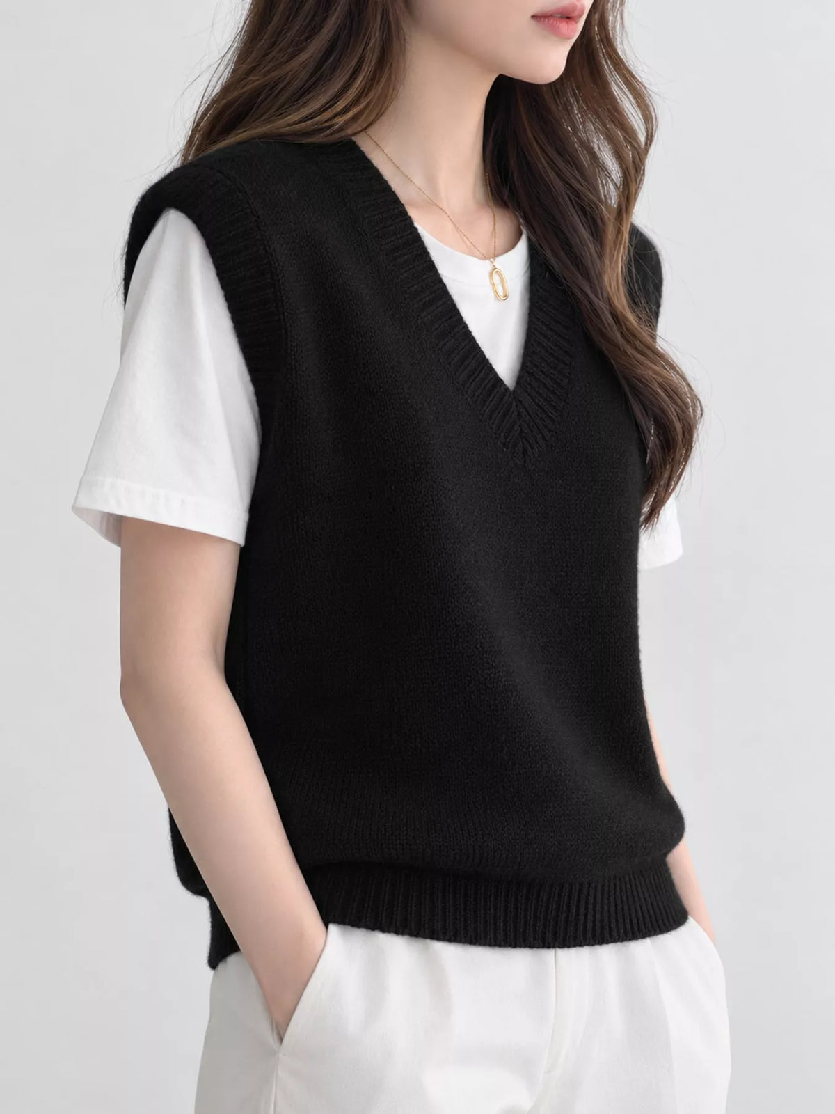 Black v-neck knit sweater vest