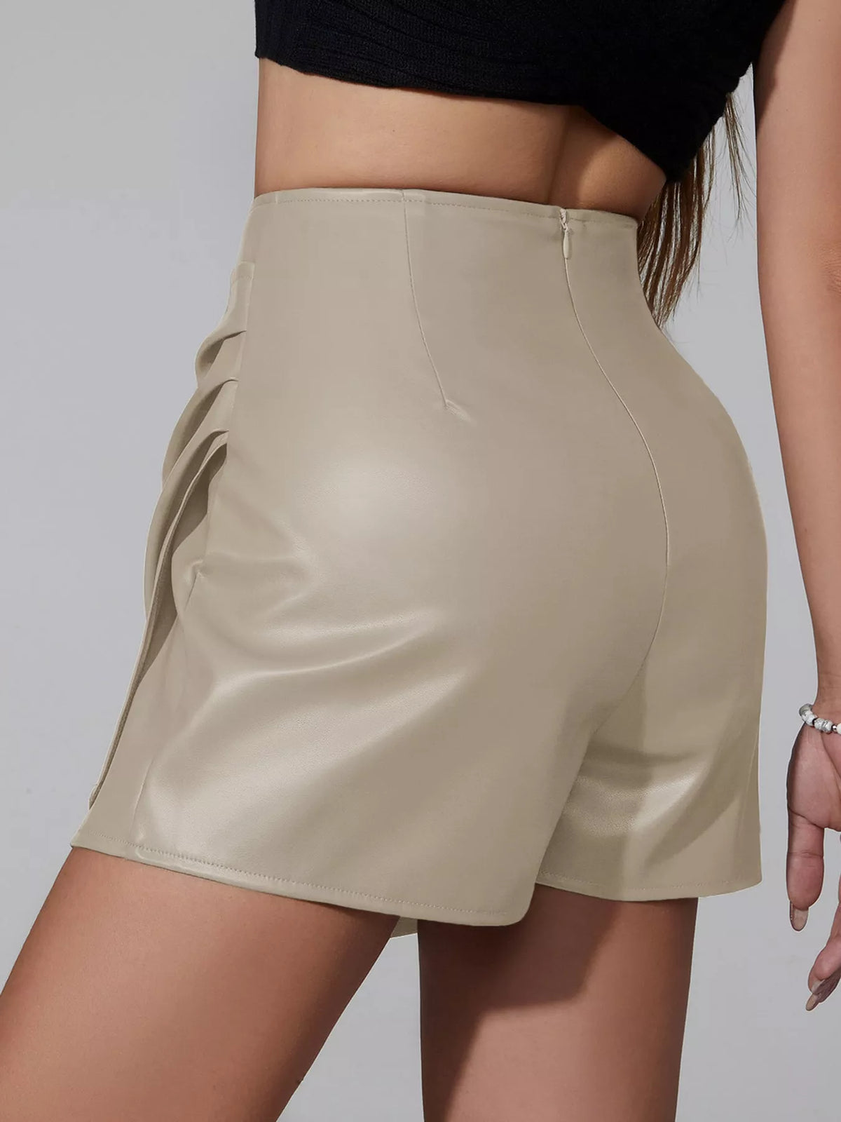 High-Waisted Ruched Faux Leather Skort — back view