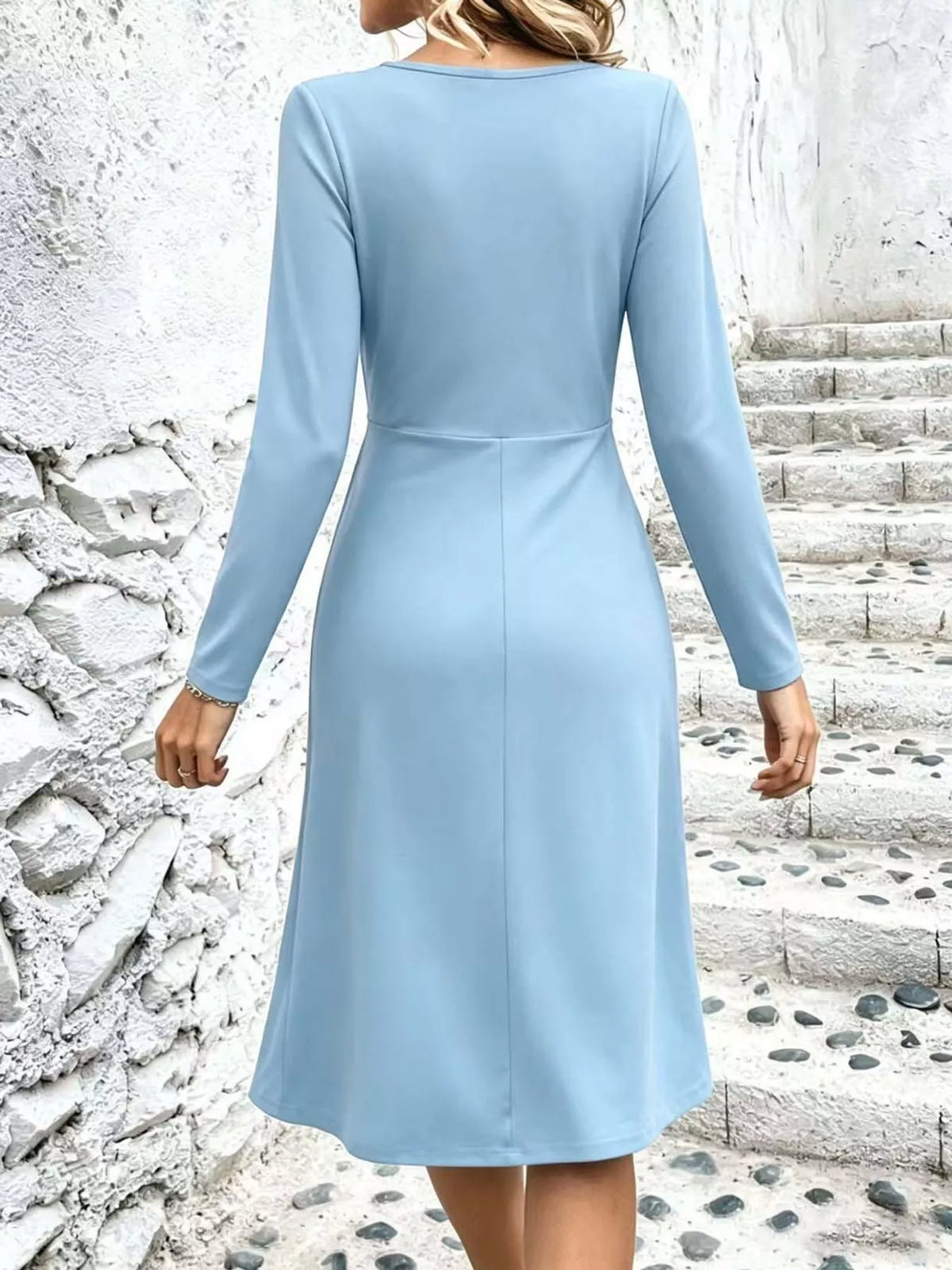Light blue long sleeve ruched-front midi dress, back view