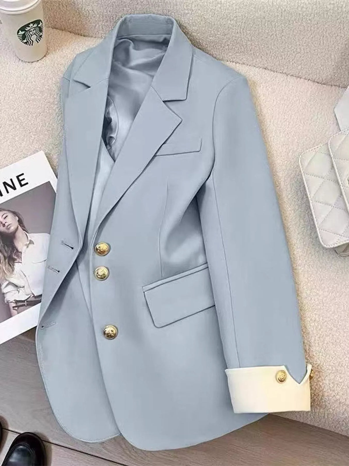 Blue single-breasted blazer with gold-tone buttons