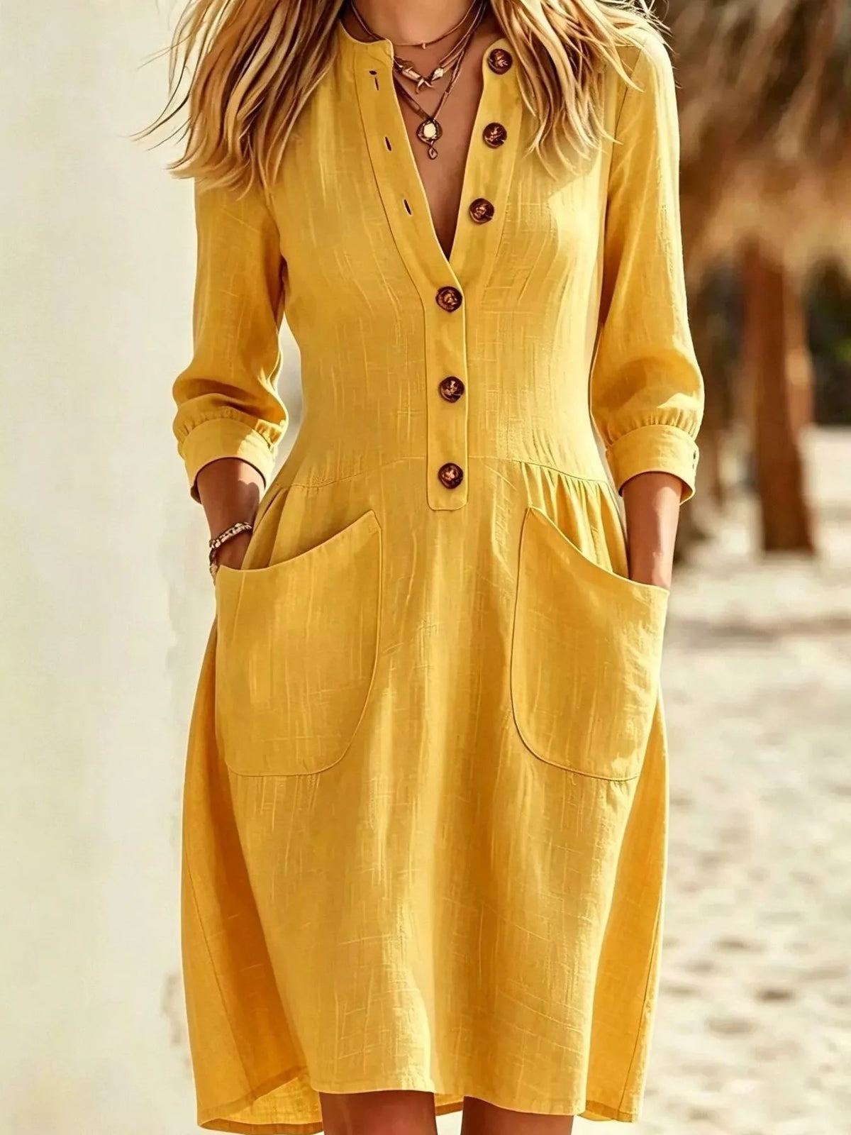 Yellow button-front dress with patch pockets, front view