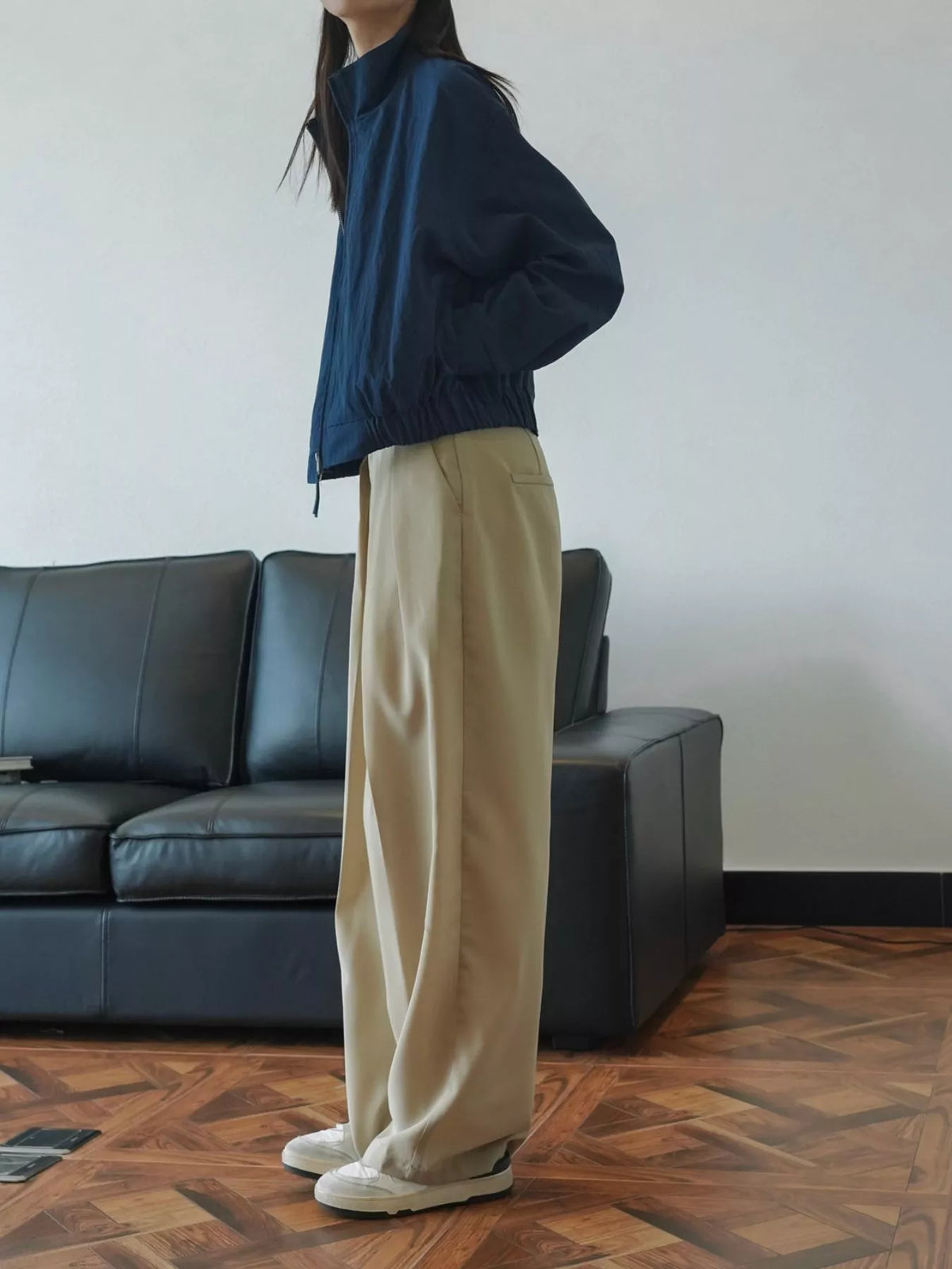 Women's High-Waisted Pleated Wide-Leg Pants in beige — side view