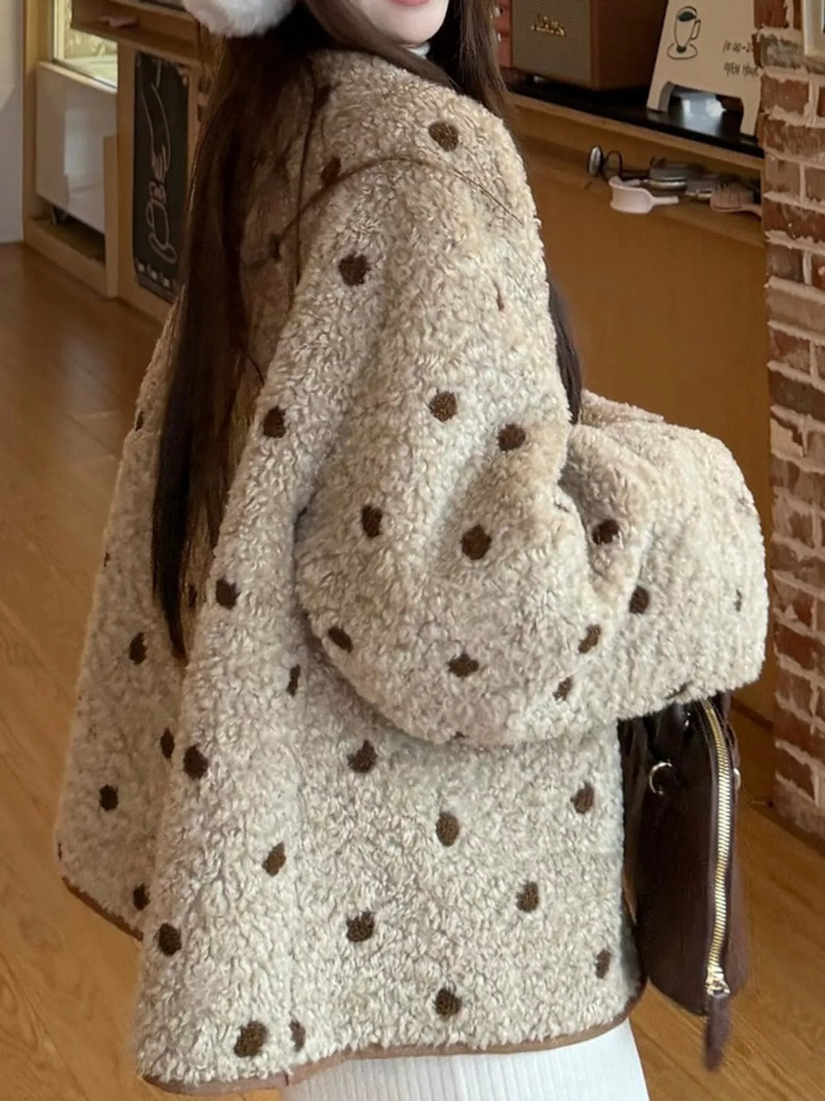 Beige with brown polka dots polka dot toggle jacket, side view