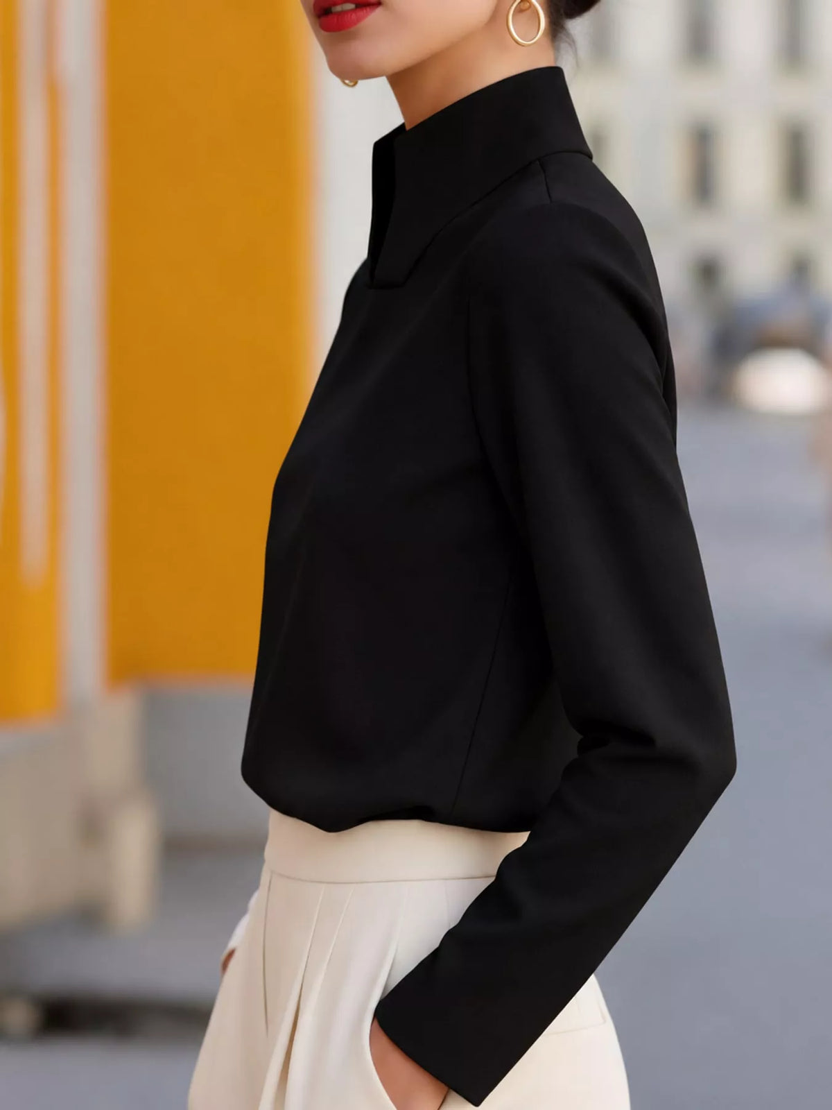 Mandarin neck long sleeve blouse, side view