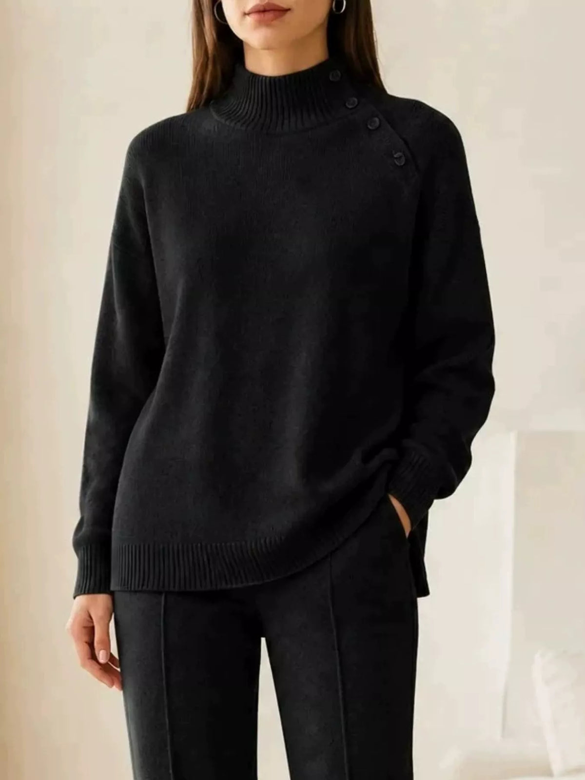 Black mock neck button-detail sweater and pants set — design and construction details