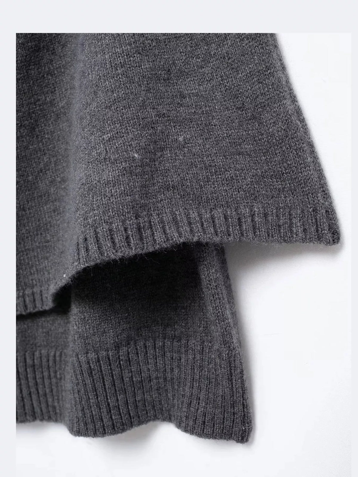 Button-Front Knit Cape Cardigan — garment construction details