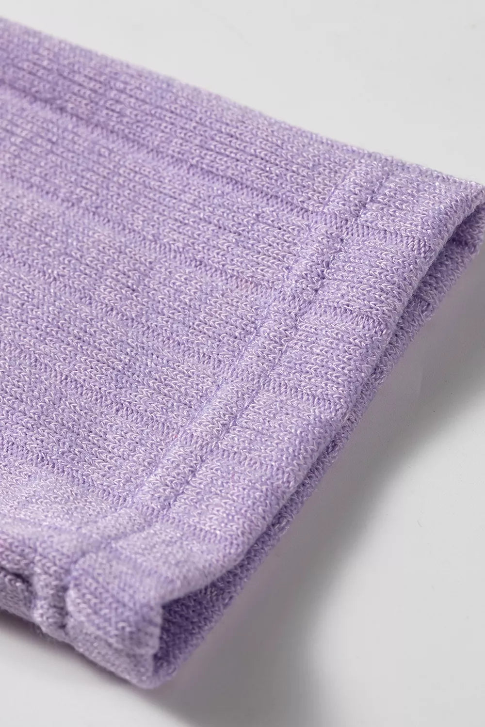 Purple ribbed long sleeve top, cuff detail