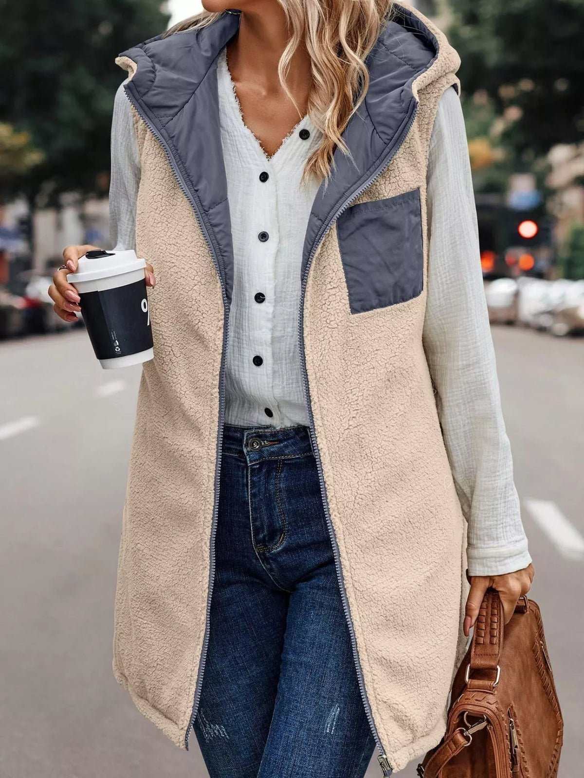 Blue-gray hooded sherpa-lined puffer vest, sherpa reverse view