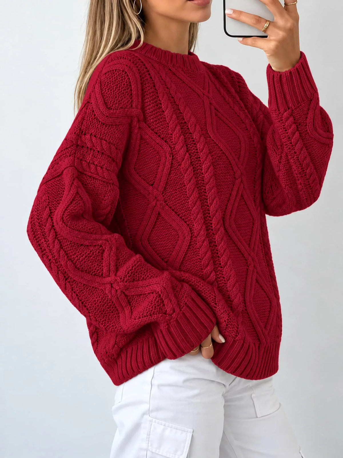 Red cable-knit round neck sweater, back view