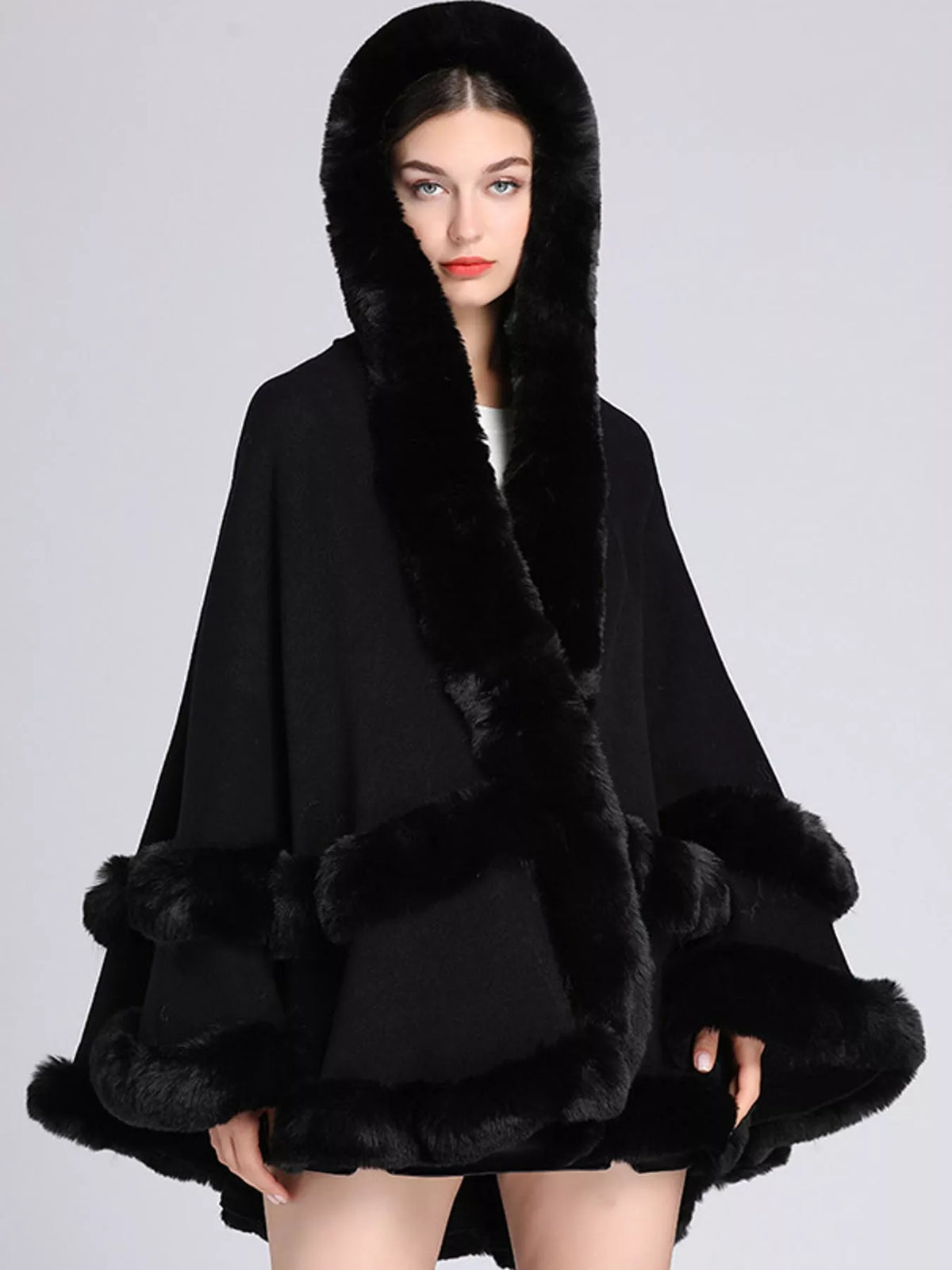 Faux-fur-trim cape, black hood raised