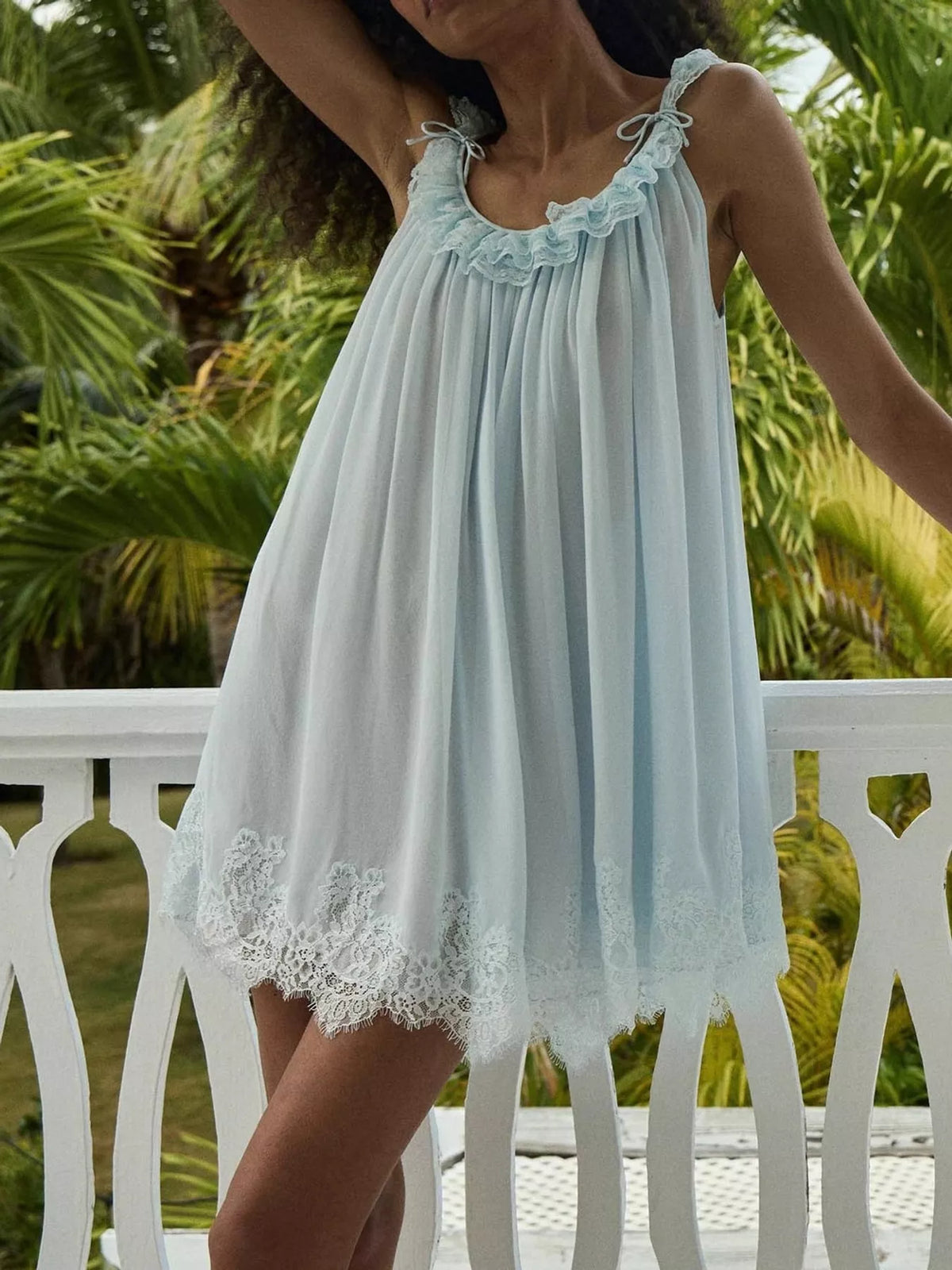 Round neck sleeveless mini dress, front view on model