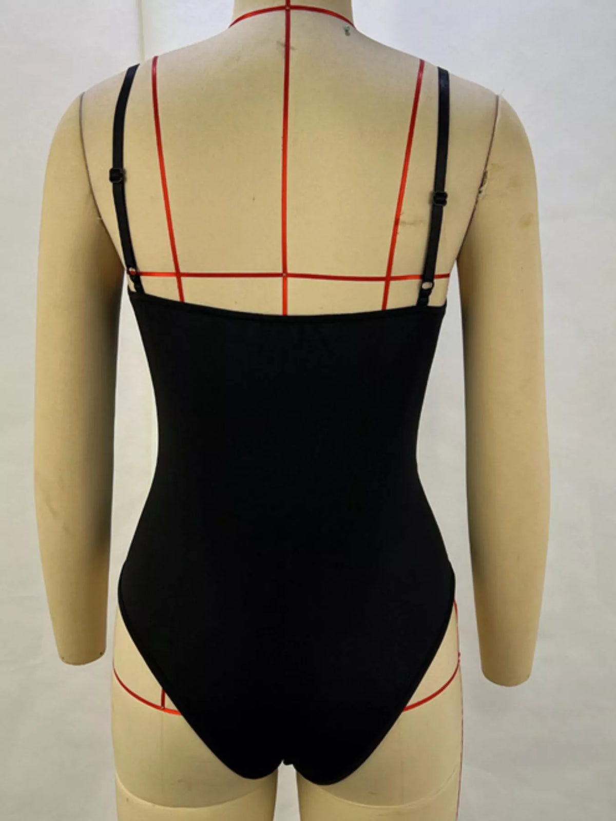 Black faux leather bodysuit, back view