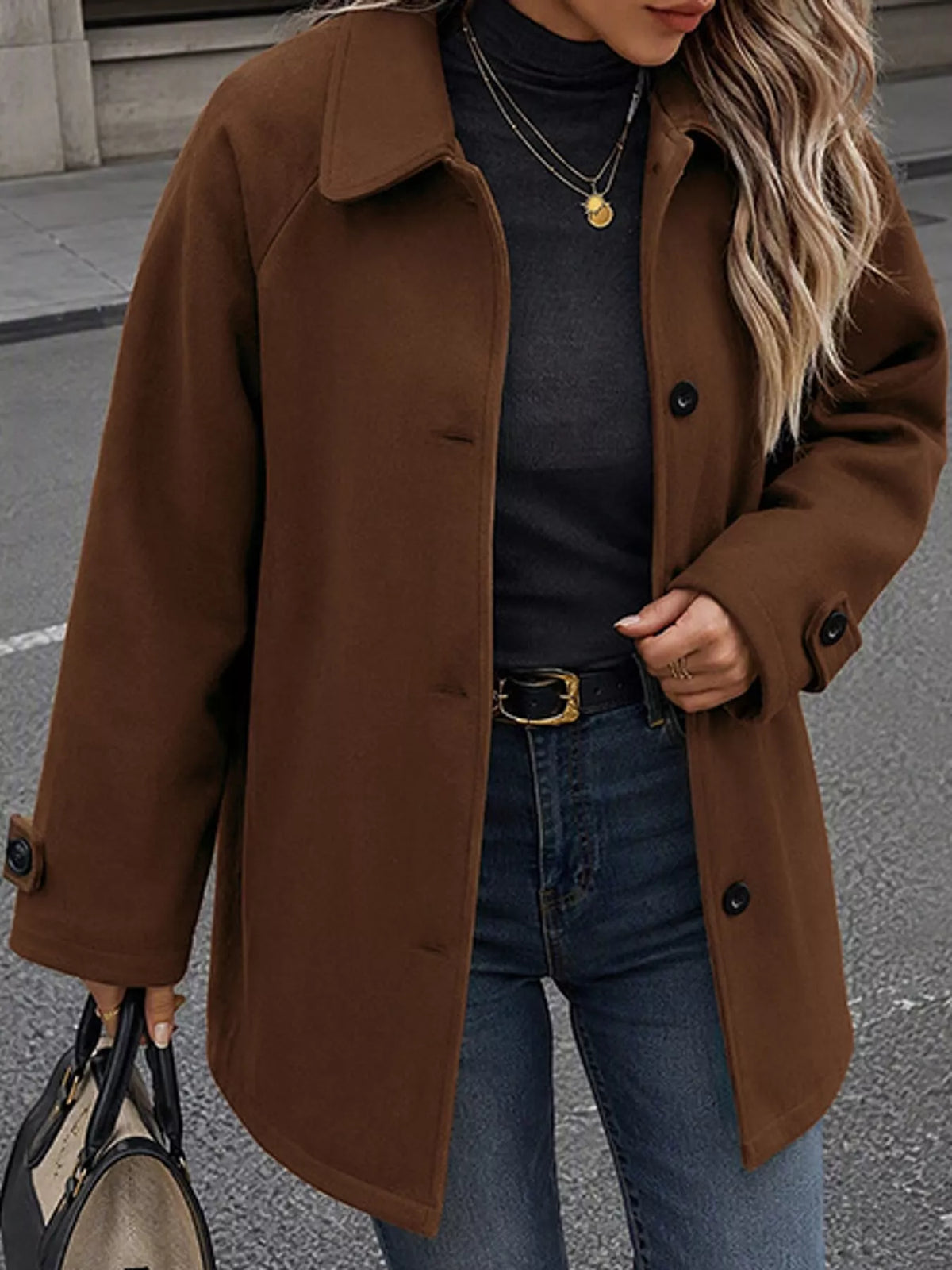 Brown button-up raglan sleeve coat — front view