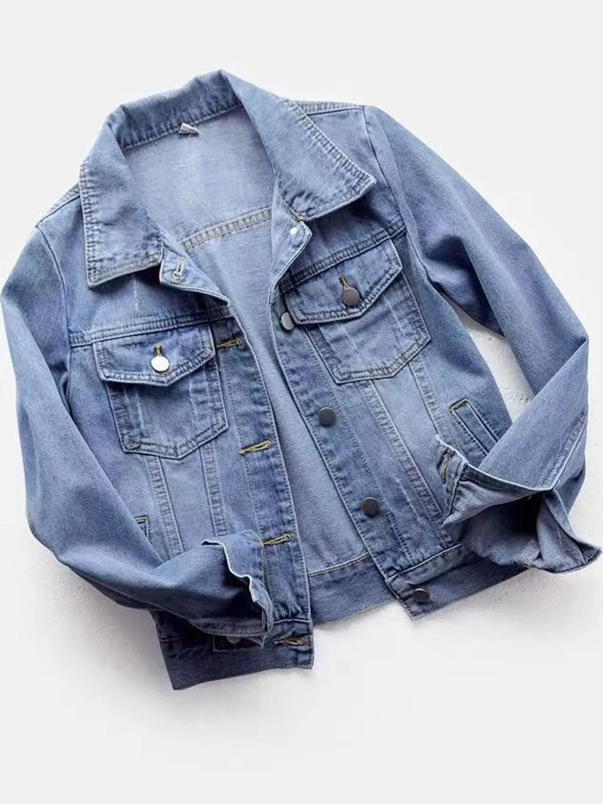 Light blue button-down front denim jacket