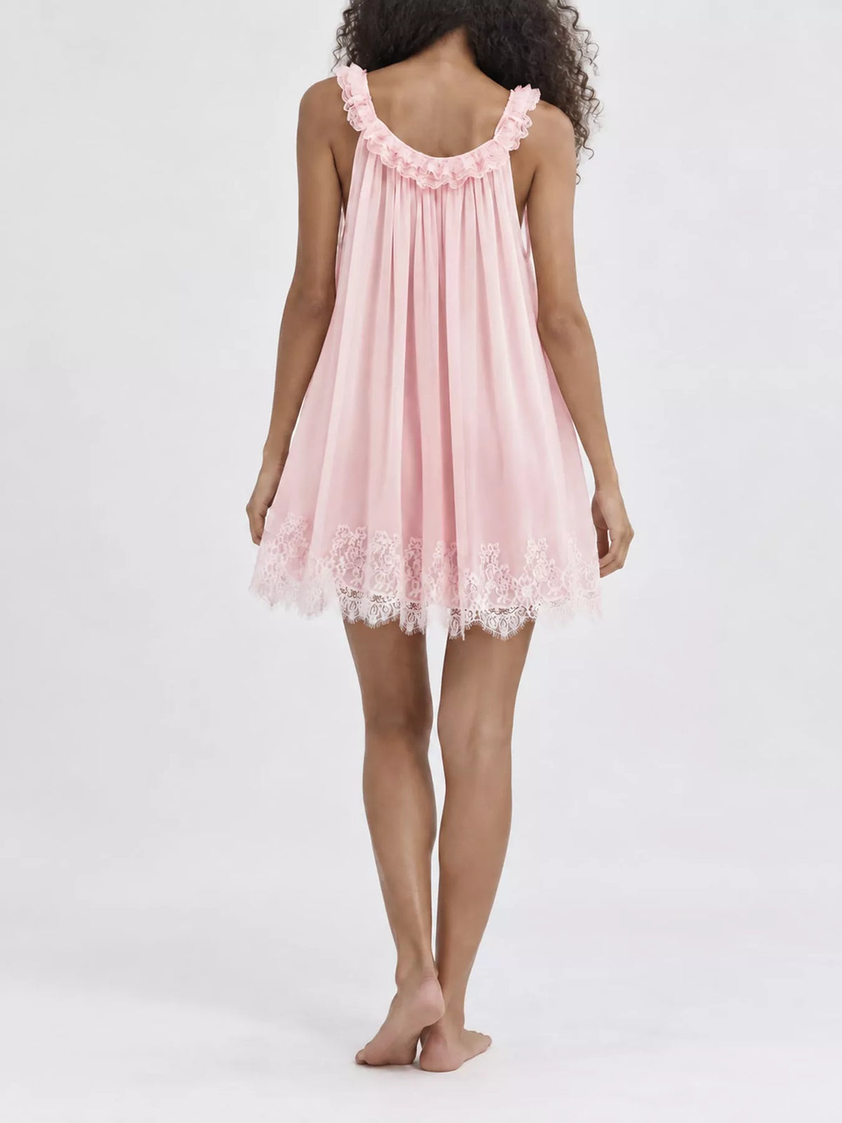 Round neck sleeveless mini dress, back view