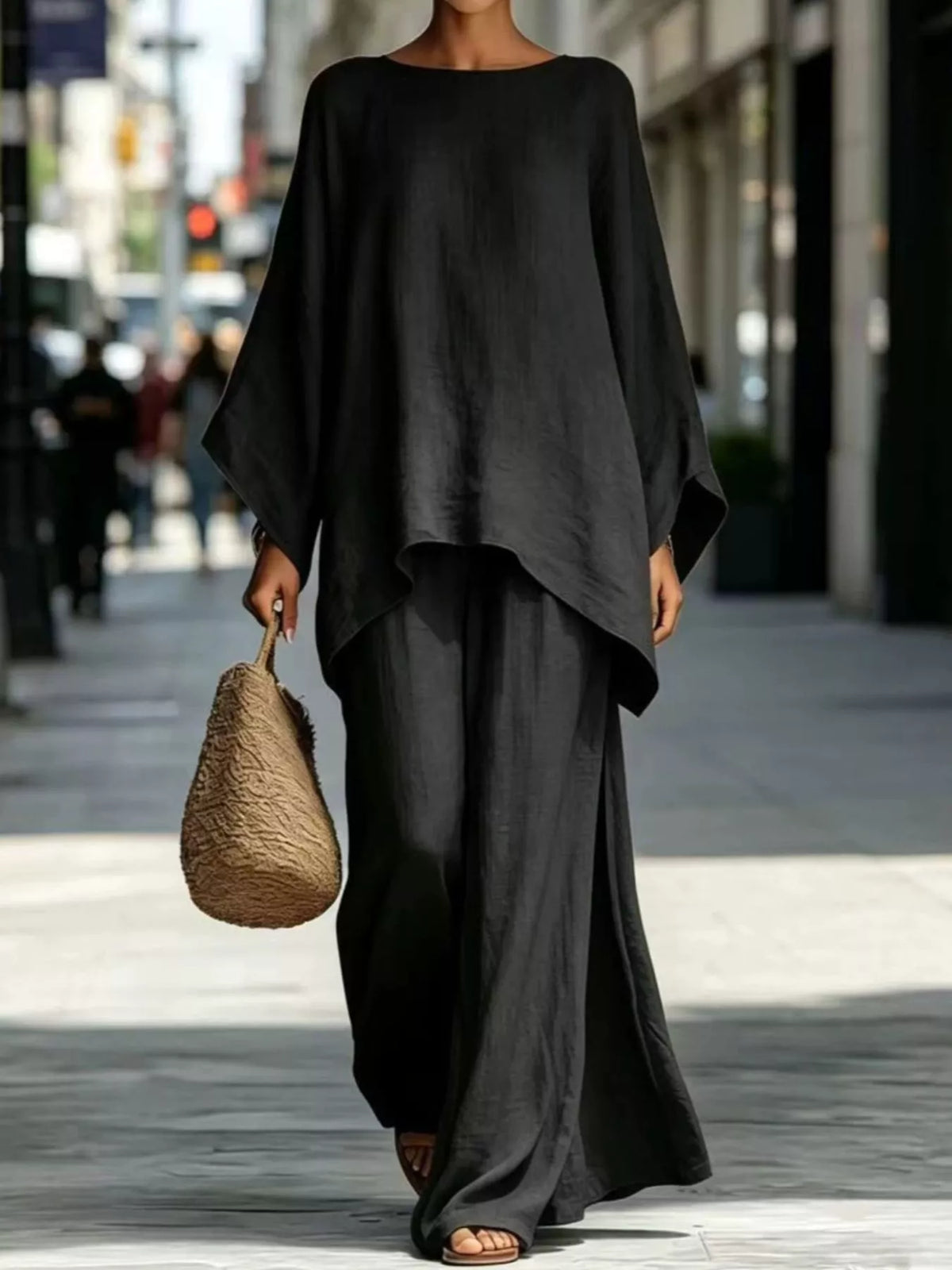Black batwing top and wide-leg pants set, front view