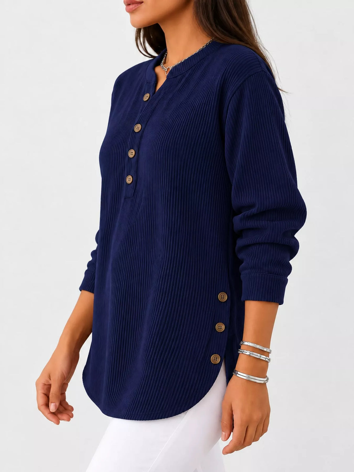 Navy button detail long sleeve top, side view