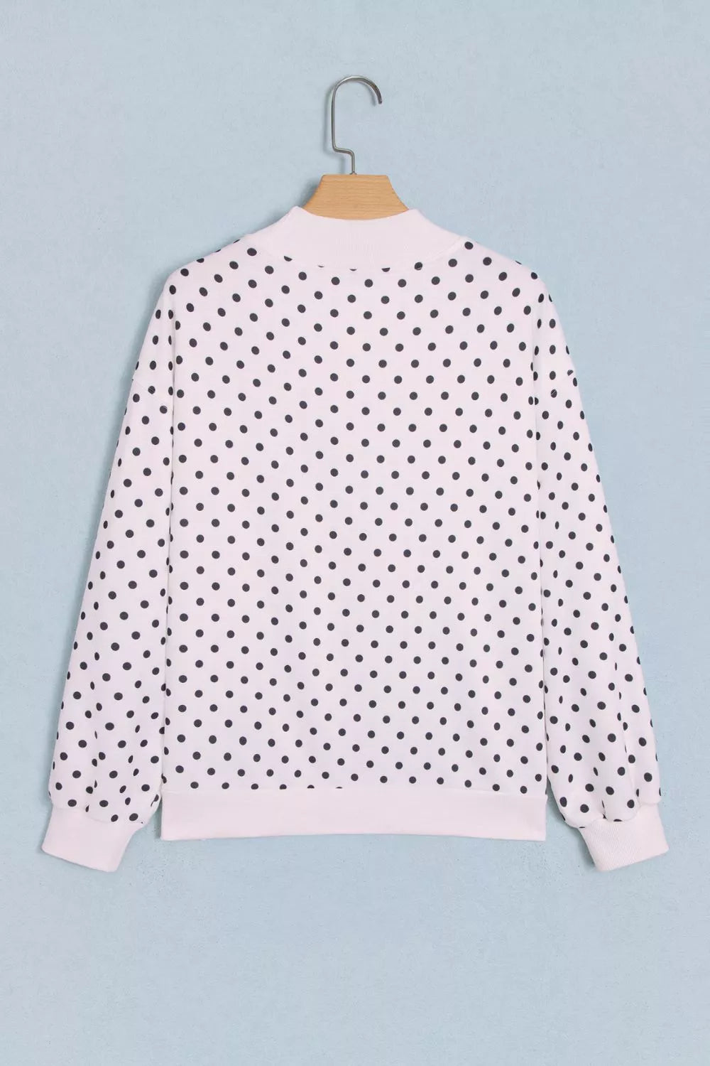 White polka dot mock neck sweatshirt, back view