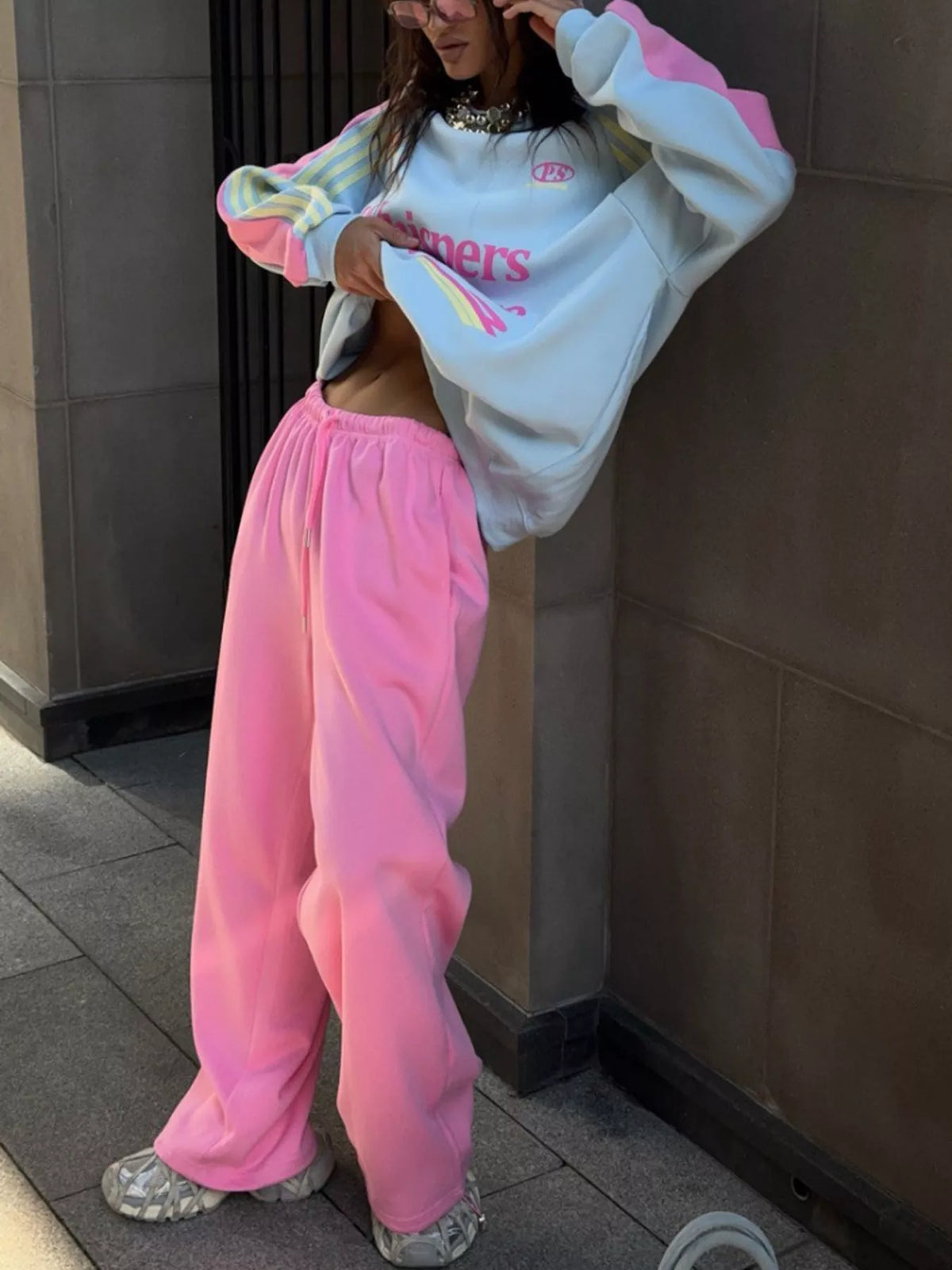 Blue top and pink pants color-block sweatshirt and wide-leg pants set — side view