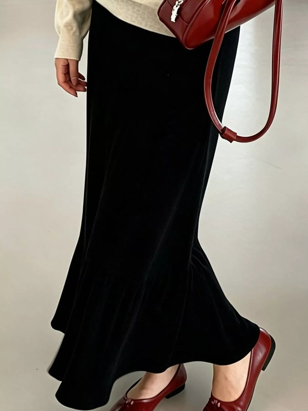 Black high-waisted flared skirt
