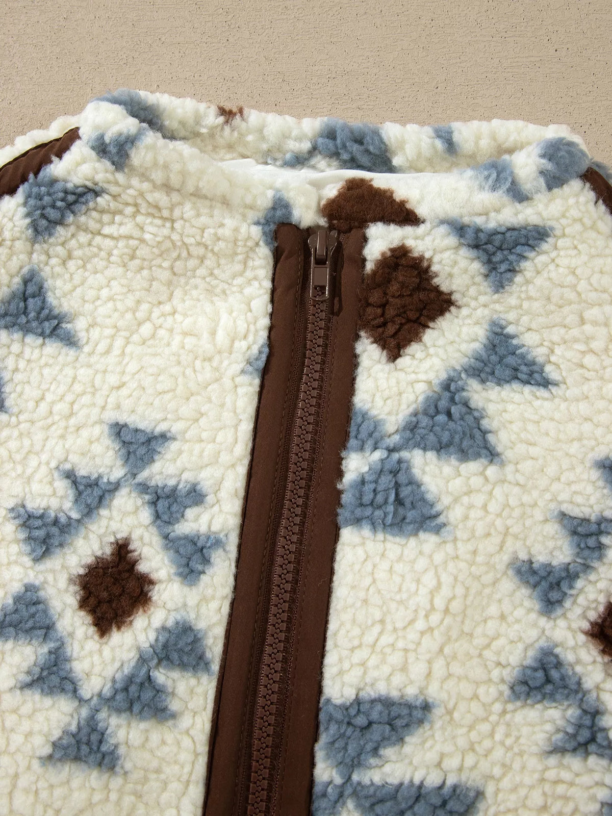 Cream blue and brown geometric print sherpa sweatshirt, neckline detail