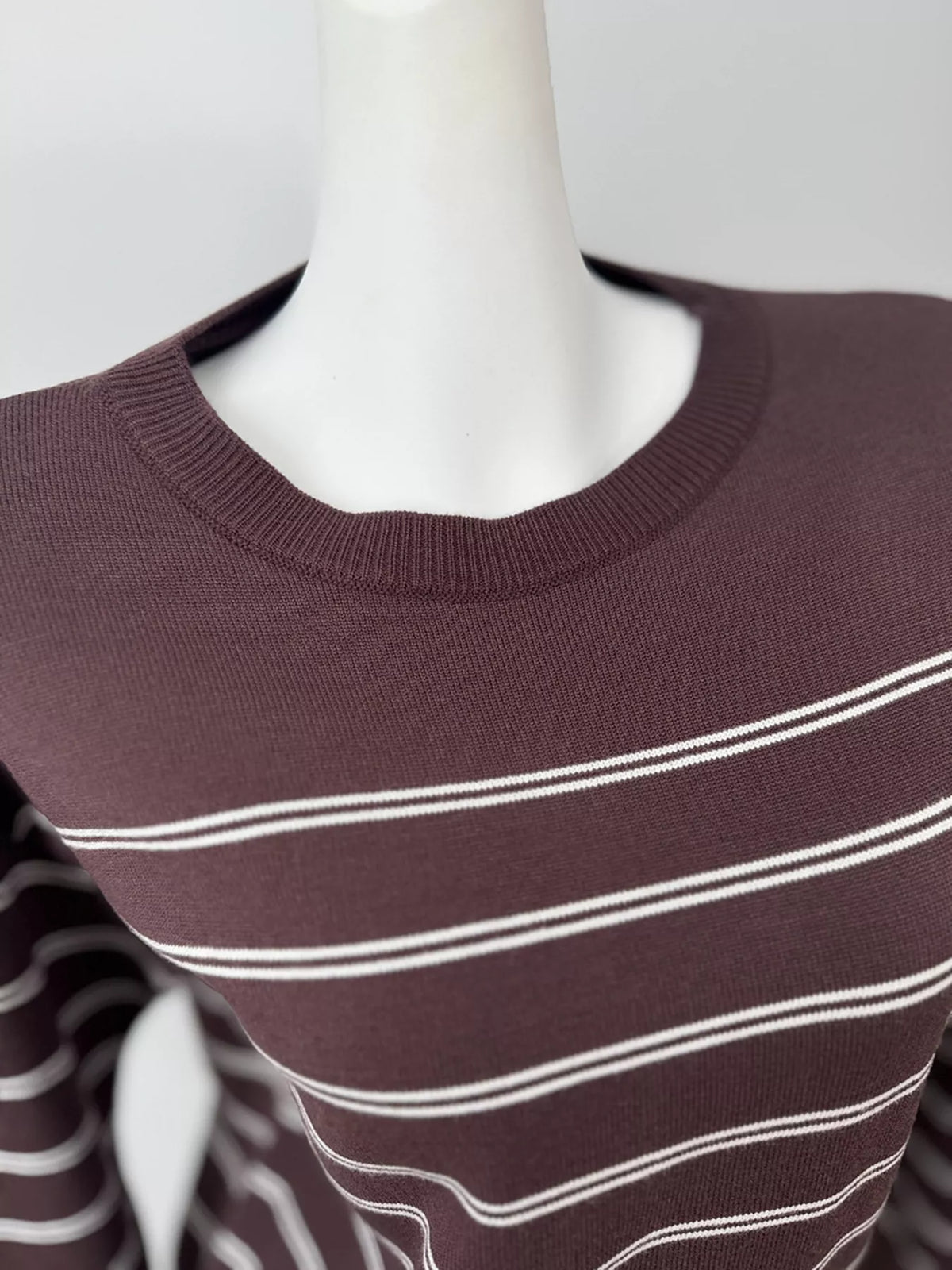 Striped crewneck sweater with layered tie detail in brown, front neckline detail