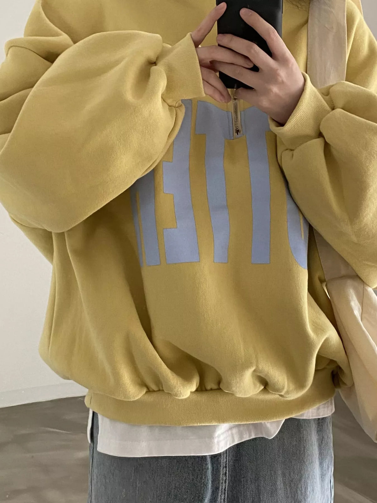 Women's Half-Zip Letter Graphic Sweatshirt in yellow — front view