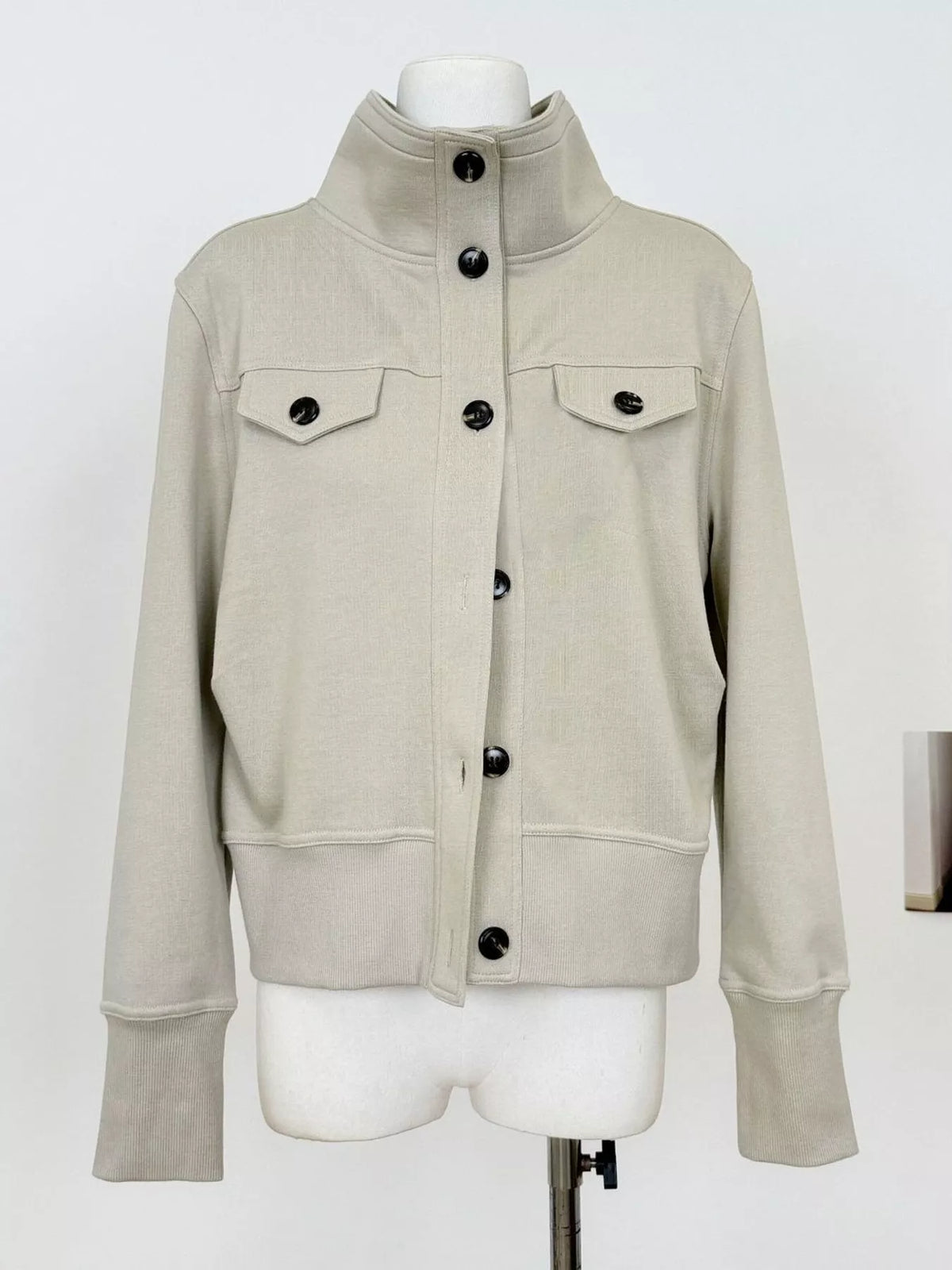 High-neck jacket, beige mannequin front