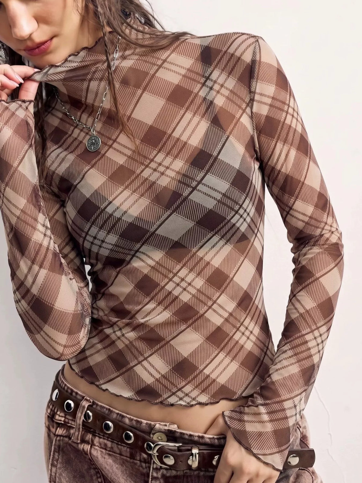 Brown sheer plaid mock-neck top, front view