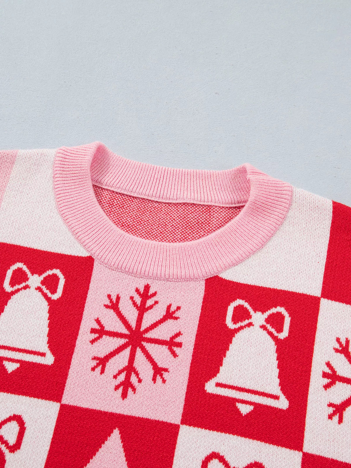 Ribbed neckline on pink and red christmas christmas patchwork round neck sweater