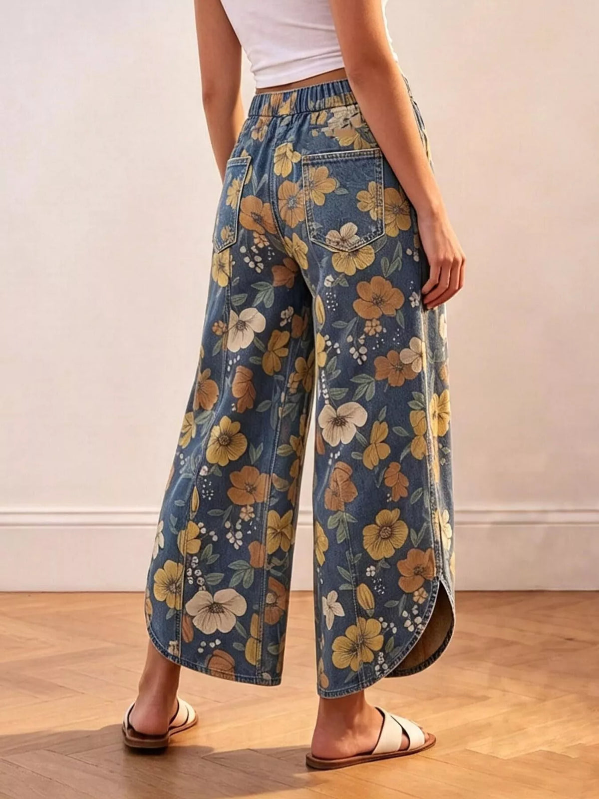 Blue floral wide-leg pants with elastic waist, back view