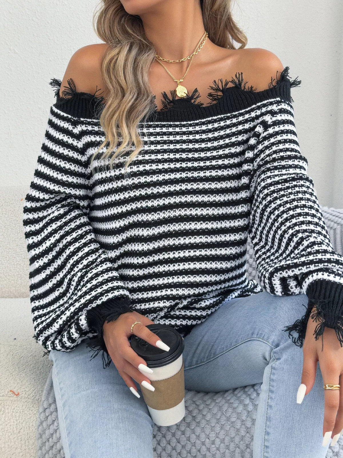 Black off-shoulder frayed hem striped sweater